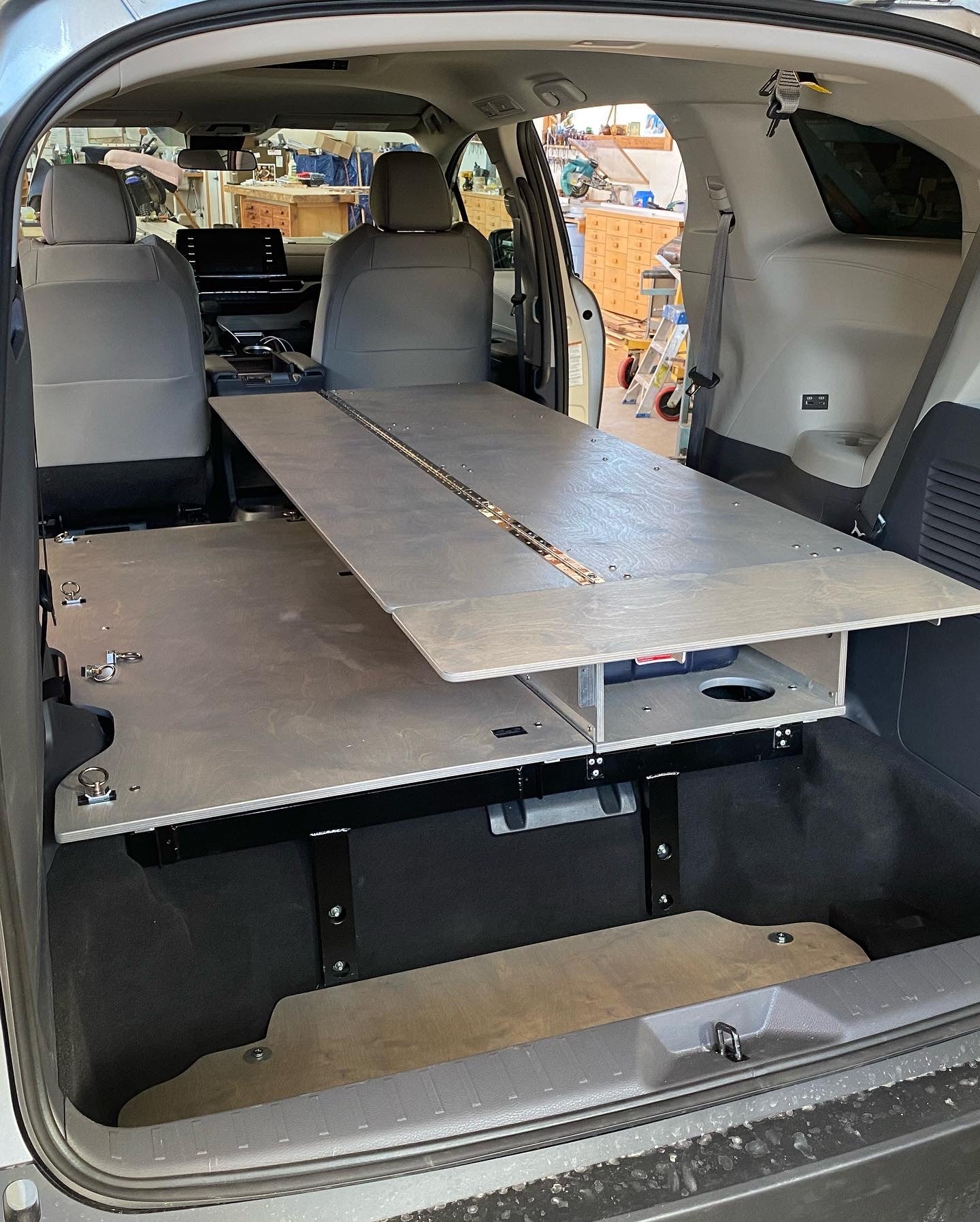 inside of a mini van conversion finished with Livos